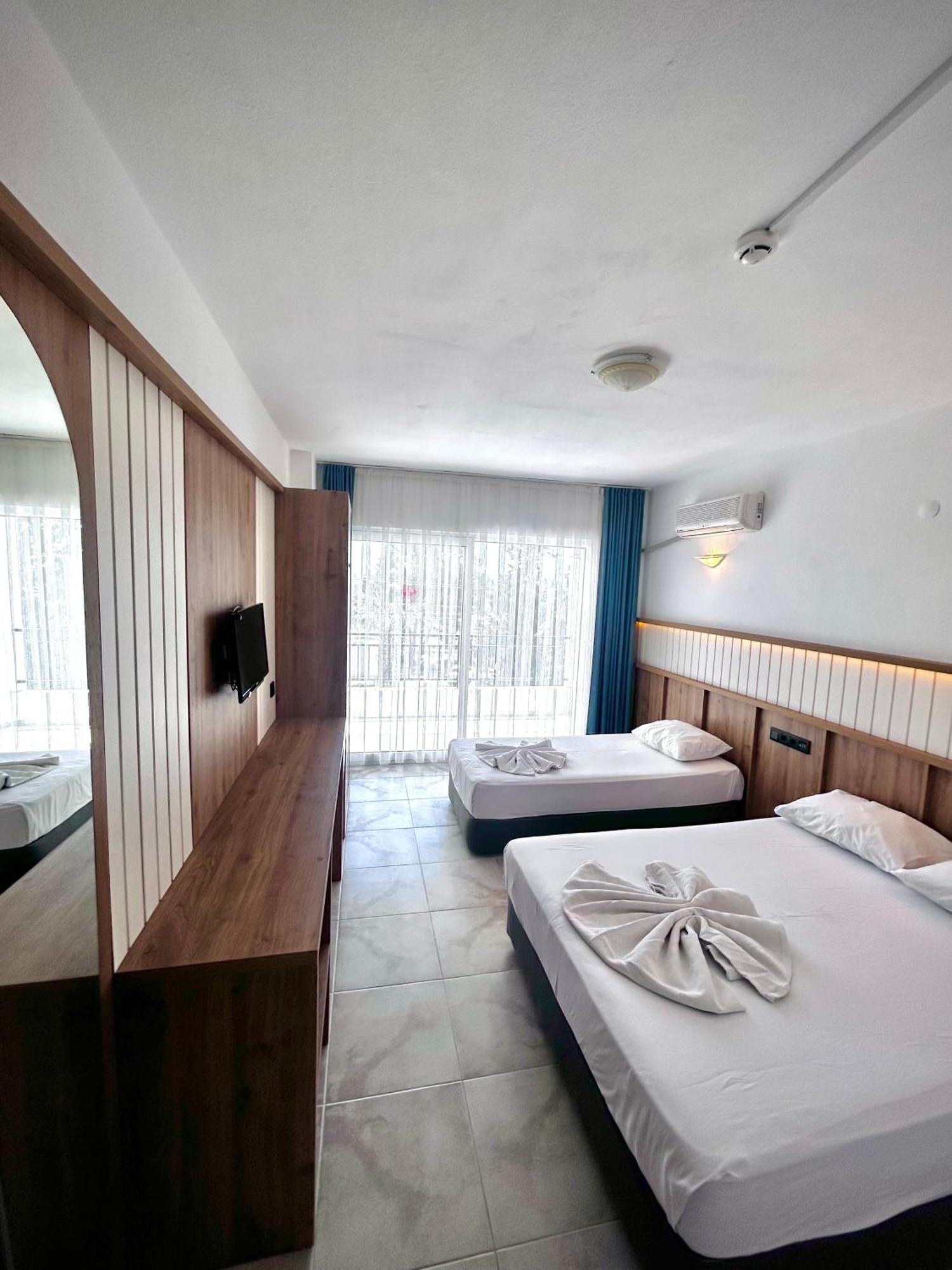 Tunan Motel Ayvalı Værelse billede