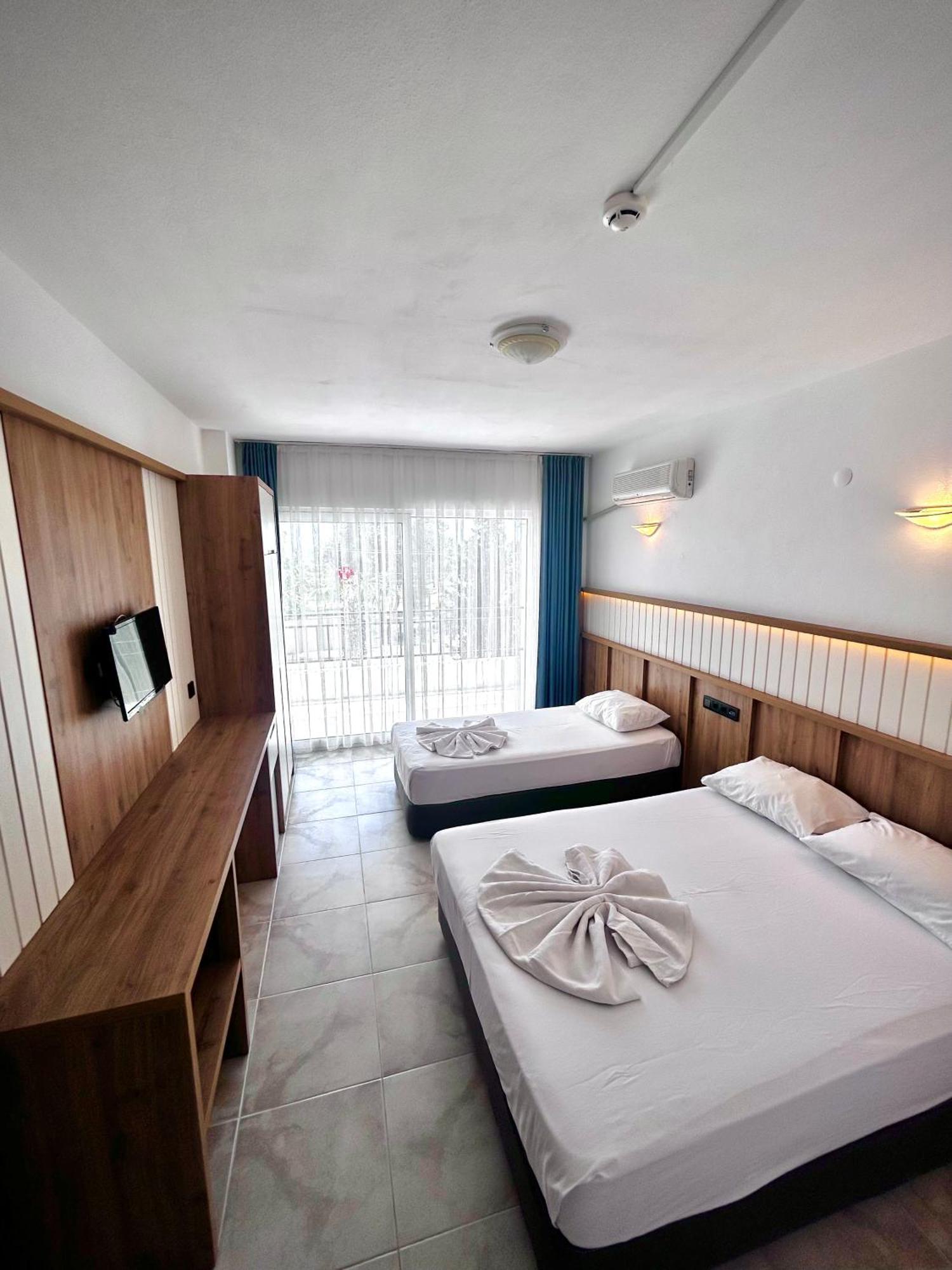 Tunan Motel Ayvalı Værelse billede